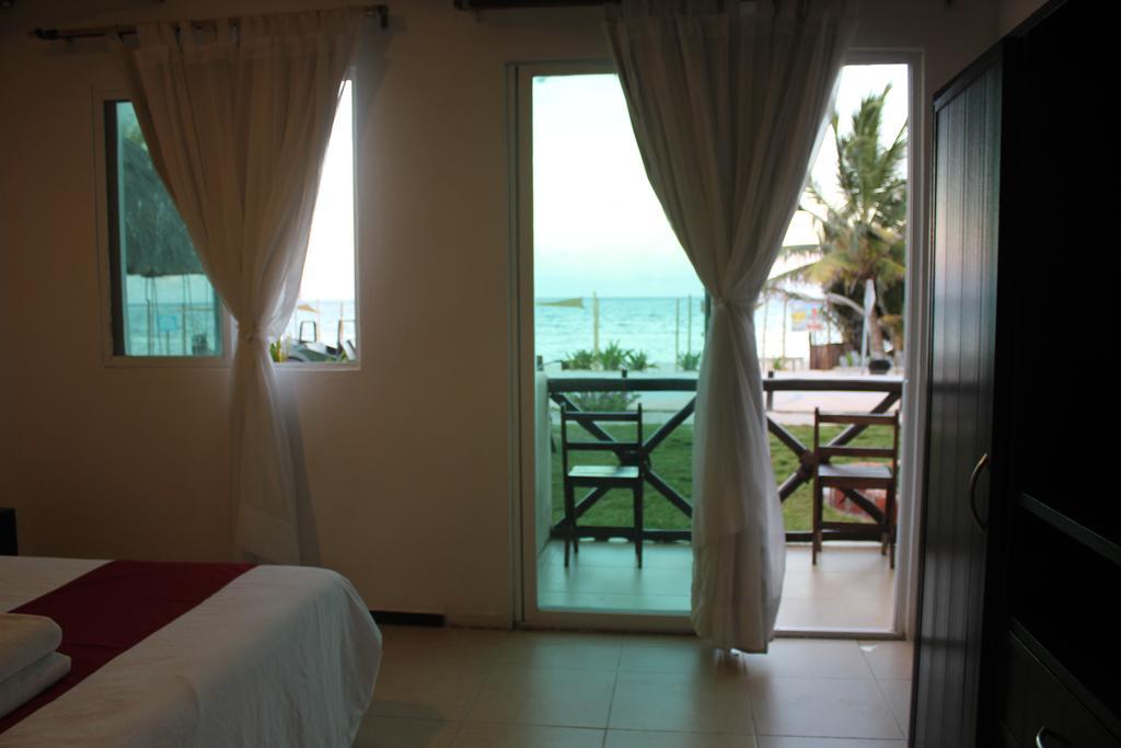 Hotel Arenas Mahahual Bagian luar foto