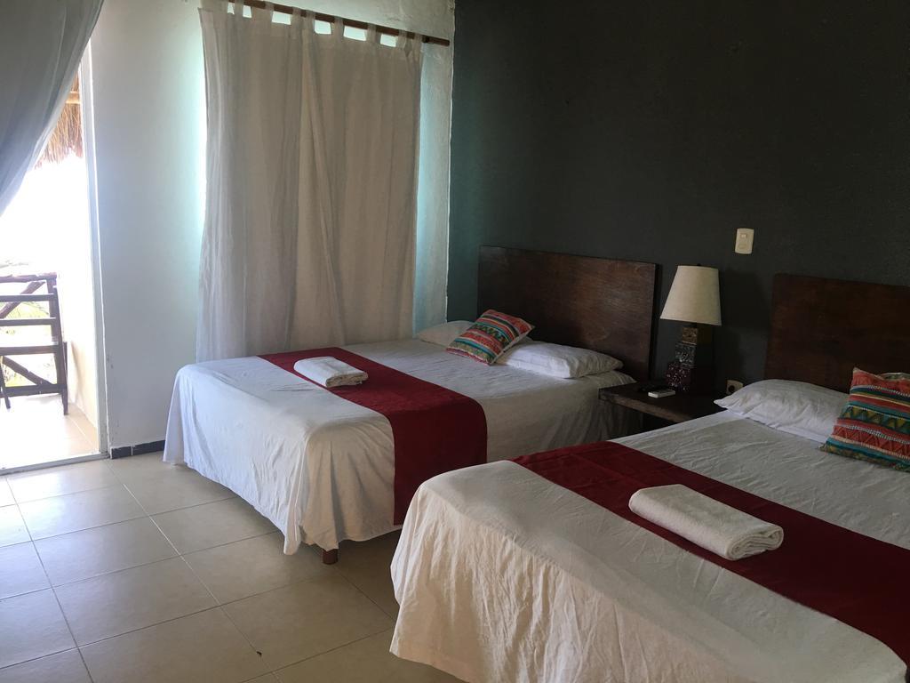 Hotel Arenas Mahahual Bagian luar foto